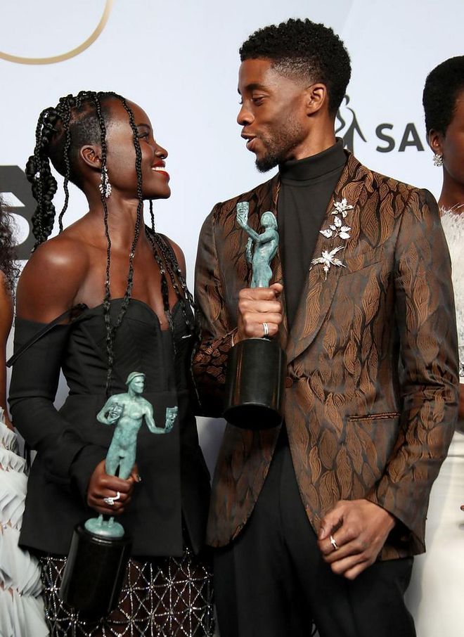 Lupita Nyong'o and Chadwick Boseman at the 2019 SAG Awards. (Photo: Dan MacMedan/Getty Images)
