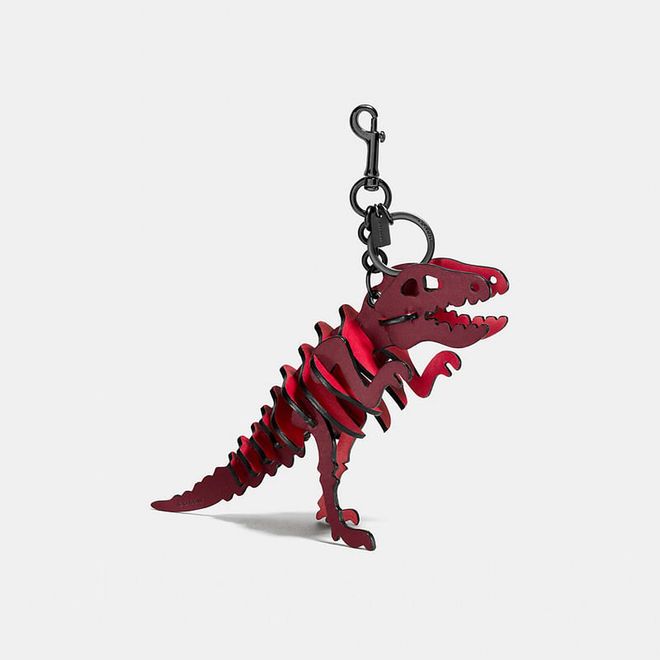 Add a witty dash of red to your bag this national Day with Coach's adorable leather Rexy bag charm in—what else?—brilliant red.