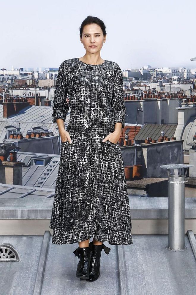 Virginie Ledoyen paired her tweed midi-length dress with a pair of ankle boots.

Photo: Getty