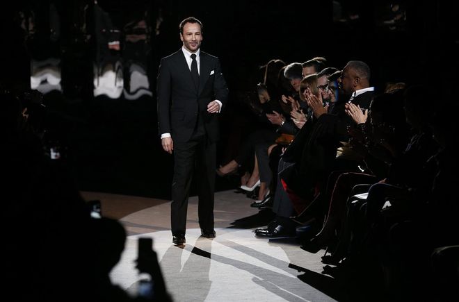 Designer Tom Ford walks on the catwalk following the presentation of the Tom Ford Autumn/Winter 2013 collection during London Fashion Week, February 18, 2013. REUTERS/Suzanne Plunkett (BRITAIN - Tags: FASHION)