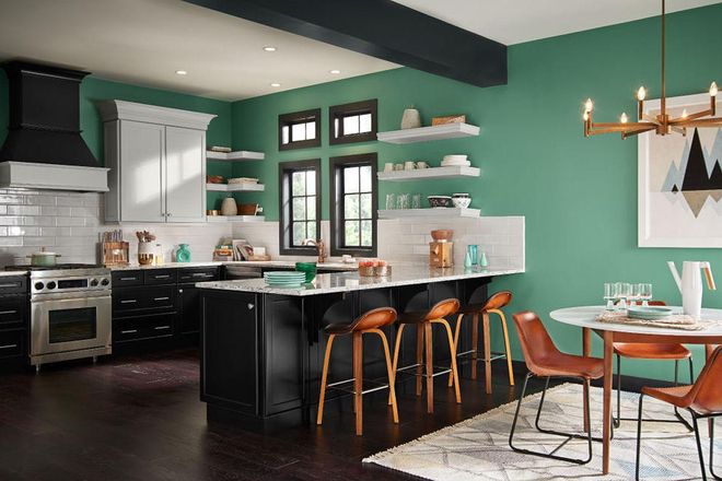 Orange accents pack a punch in a saturated green space. It's the perfect color combo for when you want to up the drama. Get the look: Jade Dragon by Behr. Photo: Behr