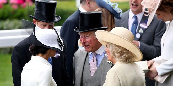 Prince Harry, Meghan Markle, Prince Charles, and Camilla Parker Bowles had a chat together on the field.
Photo: Getty
