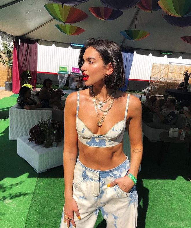 Dua is at the Bonnaroo Music and Arts Festival in Manchester, Tennessee. This acid-wash bra-top and pants are from the Esteban Cortaza's Spring 2018 RTW collection, and are perfect pieces to remind us of Dua's ability to dress amazingly for any occasion.
Photo: Instagram