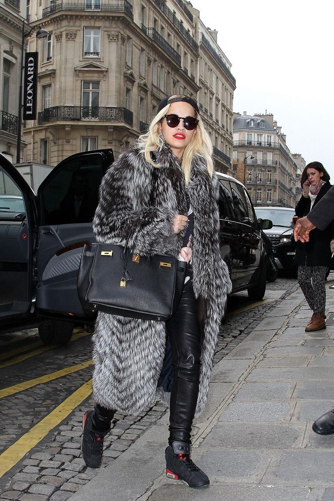 Better known for having famous friends at her side, Rita Ora lets her matte black Birkin steal the show in Paris. 
Photo: Getty