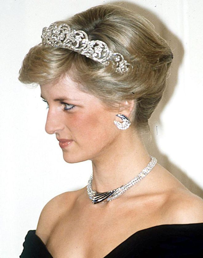 A gift from the Sultan of Oman, this modern set includes crescent-shaped diamond and sapphire earrings, along with a matching necklace and bracelet. With his mother's flare for jewelry design, Harry could have the contemporary shapes fit into a brand new piece that would offset Meghan's understated yet chic aesthetic.
Photo: Getty 