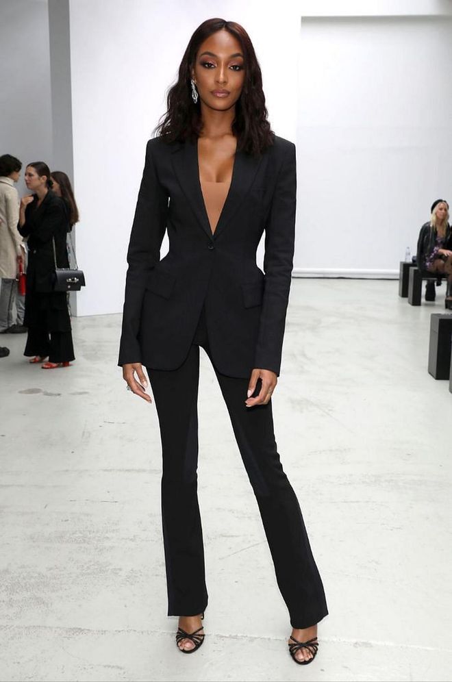 Jourdan Dunn opted for a classic black suit for the show.

Photo: Getty