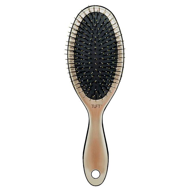 With bristles of two different lengths, this aids in snag-free detangling. Plus, the
bristles are made of a special resin that contains Moroccan argan and keratin oils
to help condition locks over time.