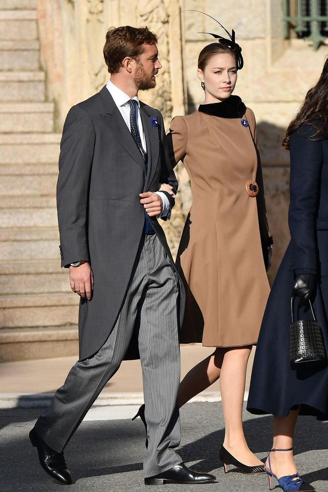 Pierre Casiraghi and his wife Beatrice Casiraghi join their family in the celebrations. Beatrice looked chic in a camel coat, black heels, and a black feather fascinator.

Photo: Getty