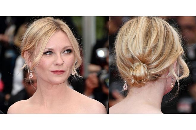 Short-haired ladies: take note of this twist. Pair a tiny chignon with tousled waves and tons of texture for big results. Photo: Getty 