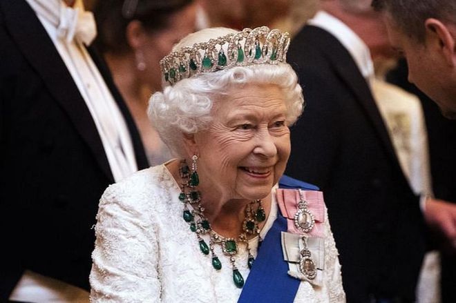 Queen Mary, the tiara’s precious owner, had the headpiece outfitted to be able to swap its original pearl drops for emeralds, which Queen Elizabeth wore at yesterday's event.

Photo: Getty