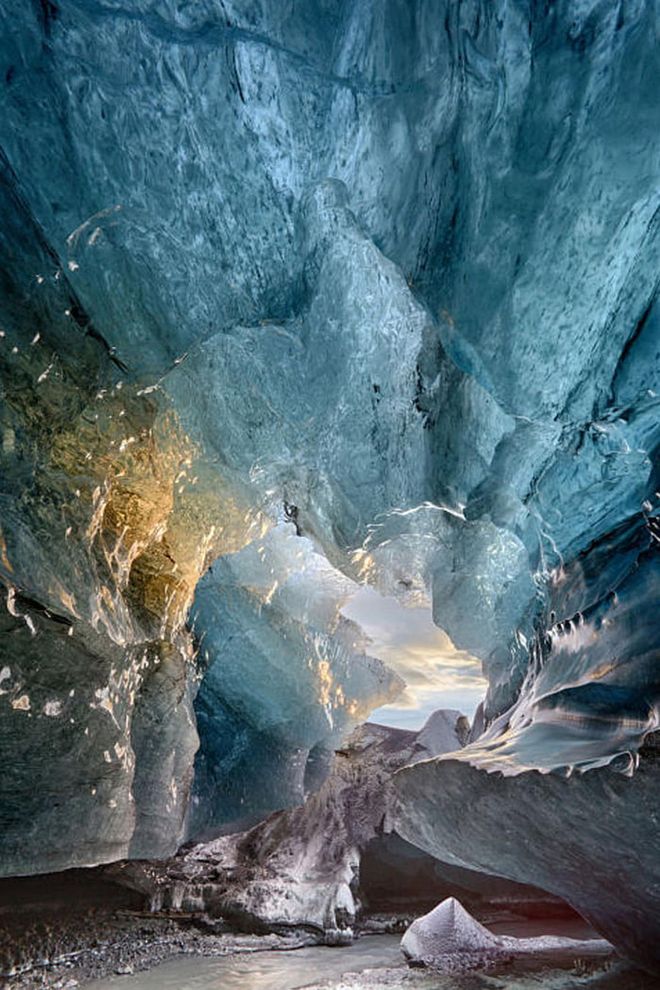 While you're at Jökulsárlón, take the time to explore the incredible ice caves underneath the Vatnajökull Glacier. Note that they are only accessible during winter when it's cold enough to safely explore the caves. Photo: Getty