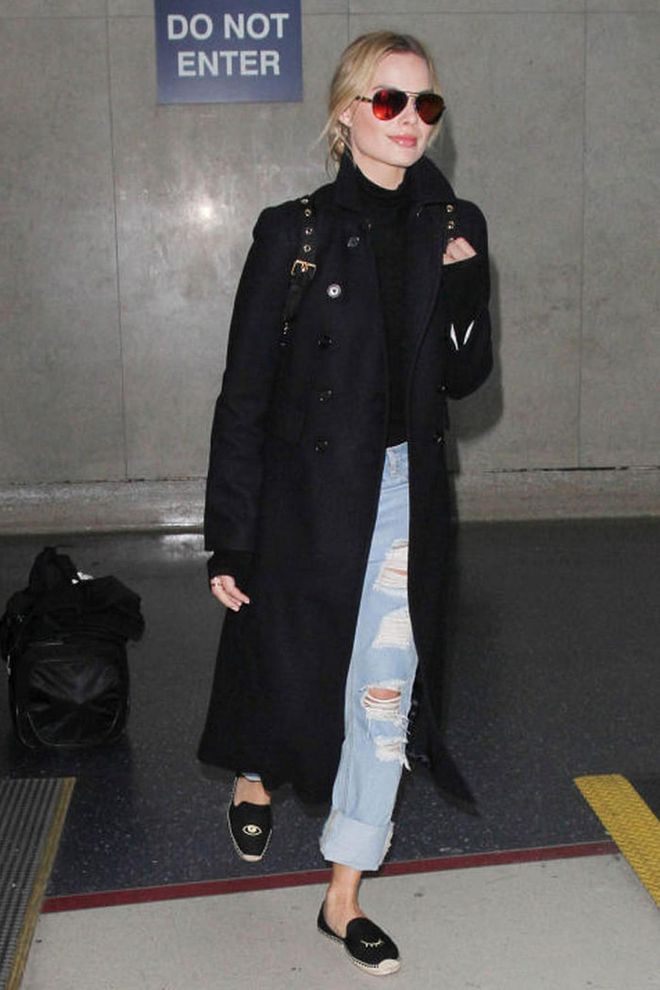 Margot Robbie proved a casual look can be just as stylish as she darted through the airport in ripped jeans and espadrilles. Photo: Getty