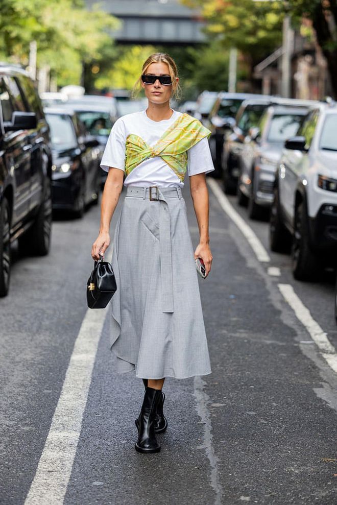 NEW YORK, NEW YORK - SEPTEMBER 10: Vera van Erp wears grey skirt, white shirt, black bag, boots outside Adeam on September 10, 2023 in New York City. (Photo by Christian Vierig/Getty Images)