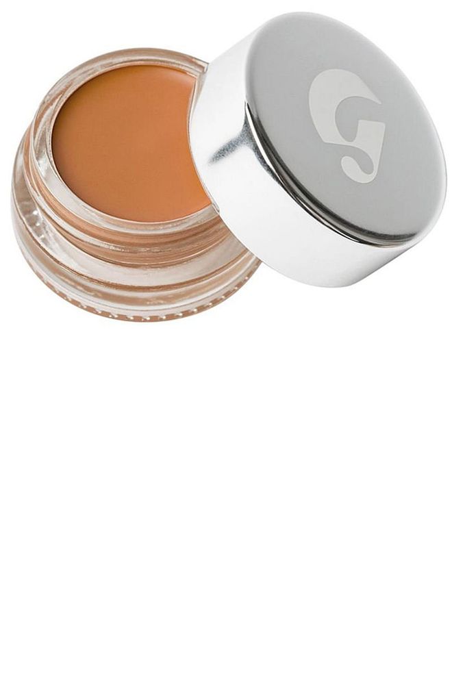 This concealer has a dewy finish (but doesn't slide off!), so it looks significantly less obvious than the ones that turn dry and matte. Photo: glossier 