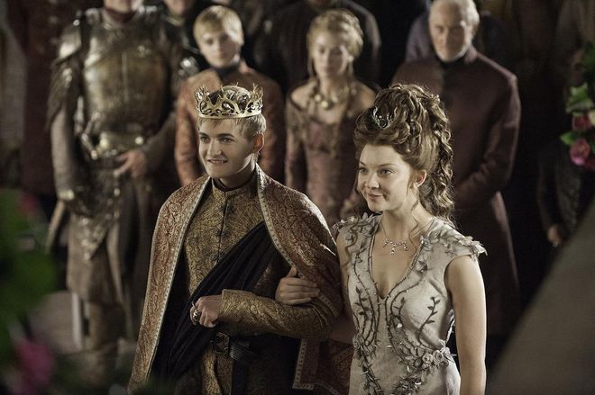 Blushing bride Margaery Tyrell appears in a high-volume hairstyle that shows off her silver rose crown