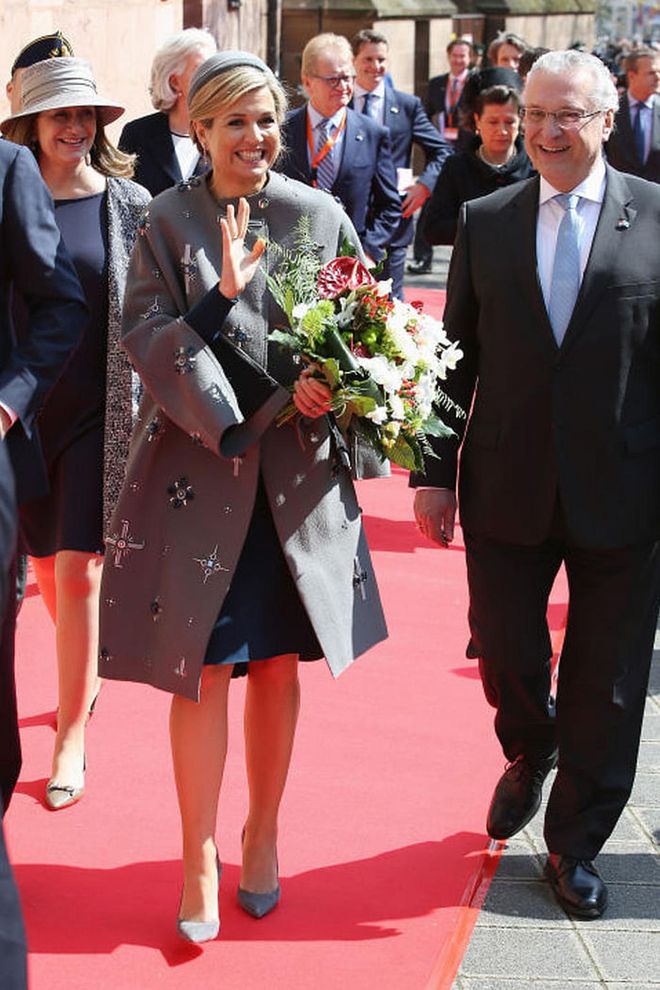 Dutch is her third language after her native Spanish and English; her taste embraces both the trendy and the conservative, like this jacket-and-hat combo for an official engagement in Germany this year.