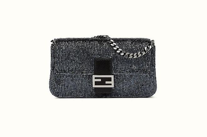 The Fendi baguette bag first found fame in Sex and the City, after Carrie Bradshaw gave it her patronage. It fast become the It bag of the Noughties, and has recently been updated with embellished detailing. 