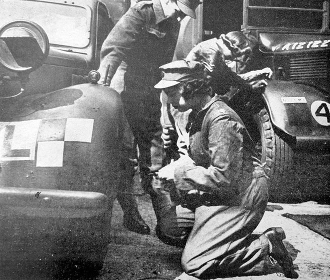 Then- Princess Elizabeth working as a truck mechanic during World War II. Photo: Getty 