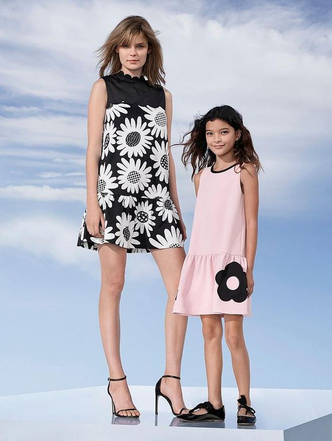 Women's Black Daisy Drop Waist Dress, $40; Girls' Blush Flower Pocket Dress, $28. Photo: Target 