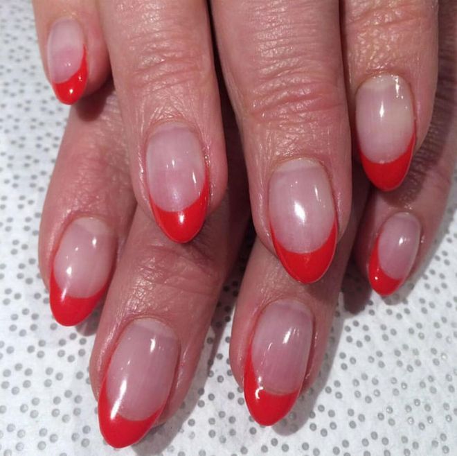 The new way to wear red: on a clean glossy nail and along the tip only. For spring and summer, choose a shade with orange or cherry tones.  
@vanityprojects 