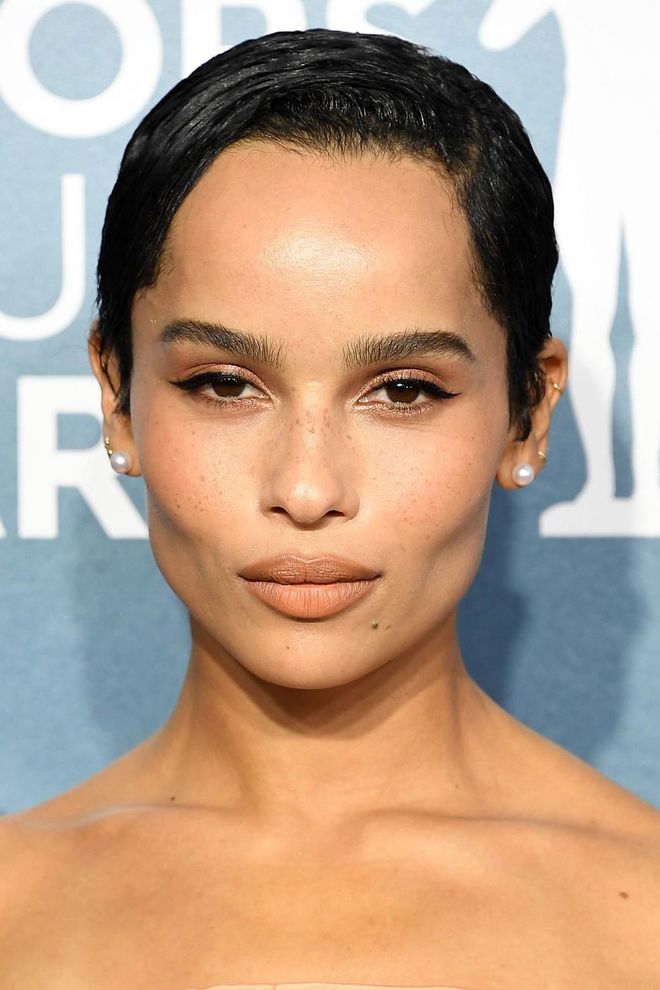 With her cool crop and strong brows, Zoe Kravitz's look was as striking as ever, this time enhanced with feline flicks and nude tones of make-up.

Photo: Steve Granitz / Getty