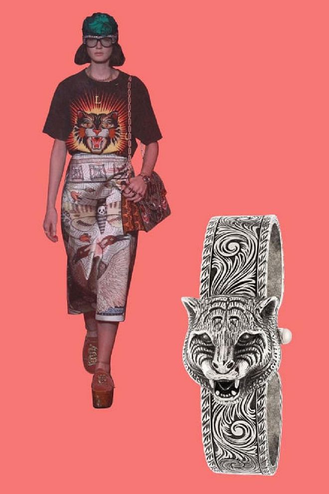 We've certainly come to expect the unexpected from Gucci designer Alessandro Michele: Daring, animal-inspired pieces in stunning colors were his signature this year, including carved steel feline heads and rainbow watch straps. ME-OW.

Le Marche des Merveilles Secret in carved antique silver color steel with rotating tiger head, $1,960, gucci.com