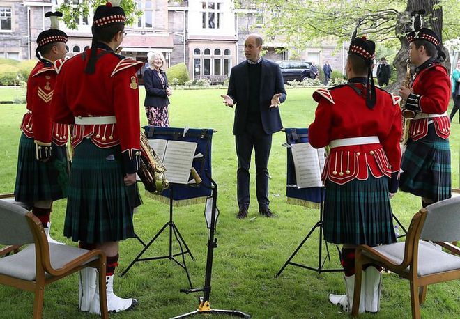 Talking to the band during a visit to the Queens Bay Lodge Care Home on May 23, 2021 in Edinburgh, Scotland. (Photo: Getty Images)