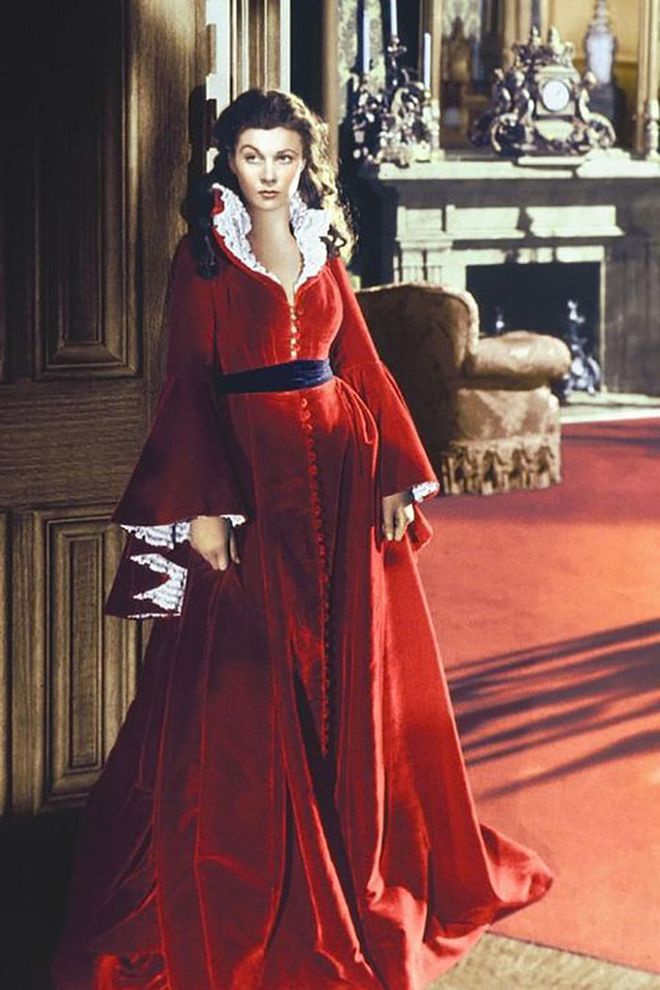Epitomizing the ultimate Southern Belle, Scarlett O'Hara boasts a wardrobe full of oversized hats, romantic ruffles, and velvet Victorian dresses in the classic film.

Photo: Getty