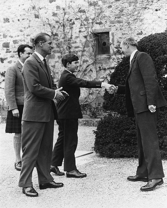 On April 2, 1962, Prince Charles met Robert Chew, the headmaster of Gordonstoun School, on his first day as a student there. His father Prince Philip, who attended the school himself, accompanied him on the big day.

Photo: Getty 