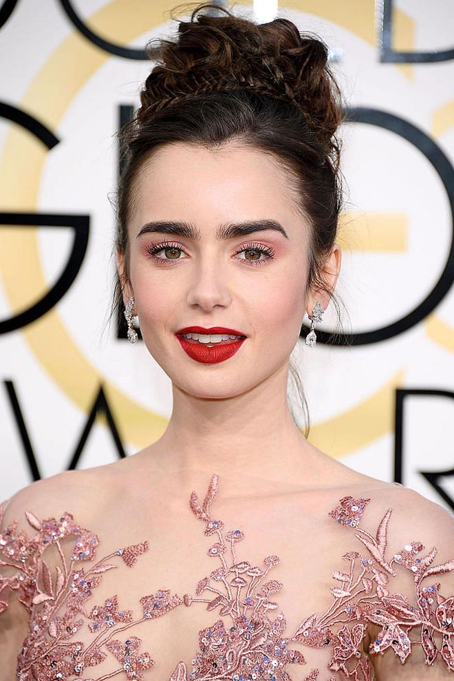 The 26-year-old paired an elegant red lip with a rosy hue on her lids (that also matches her dress!).

Photo: Getty Images
