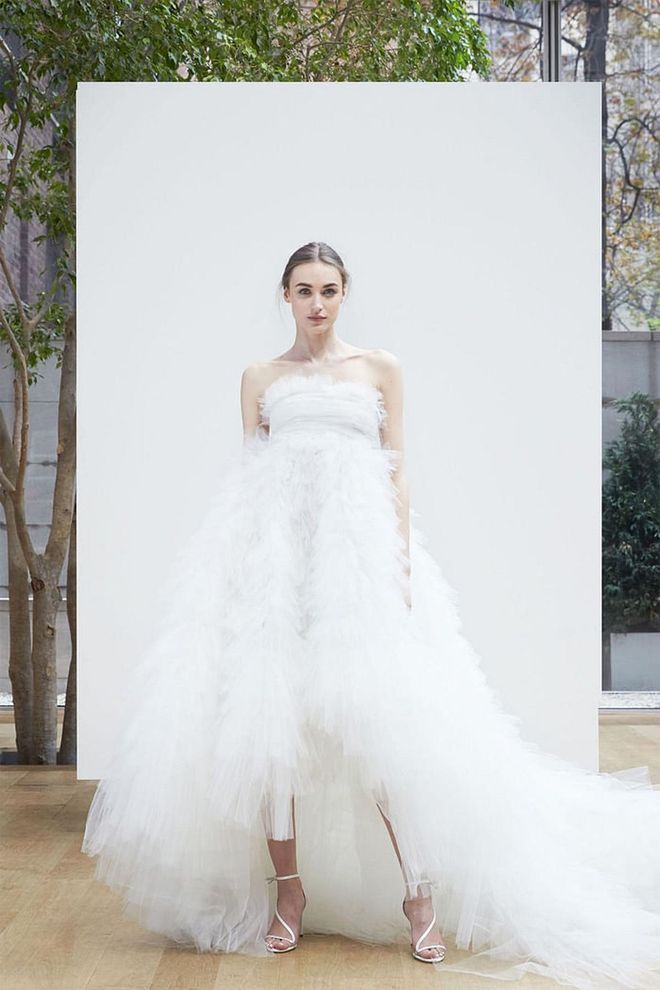 Frothy tulle was practically made for outdoor nuptials, and a high-low hem makes for easy walking through the hills- and the perfect opportunity to show off your shoes. Oscar De La Renta Spring 2018 Look 1. oscardelarenta.com. Photo: Oscar de la Renta 