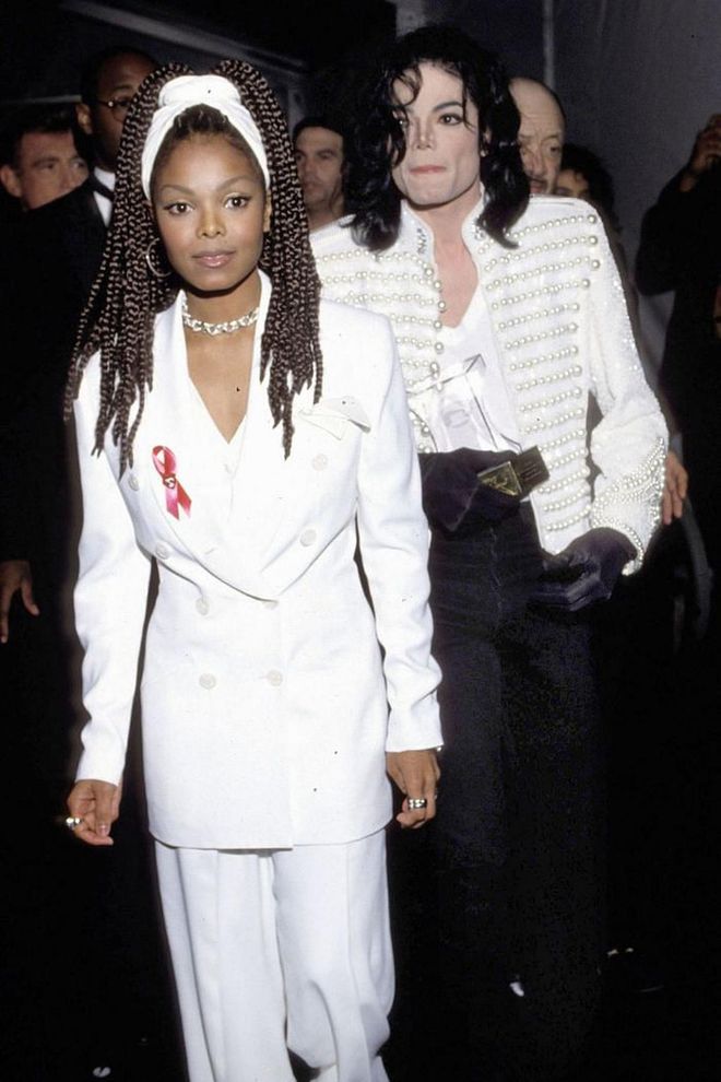 That same year, Janet Jackson and Michael Jackson had a matching sibling moment in chic white suits and red ribbons to raise awareness for AIDS.