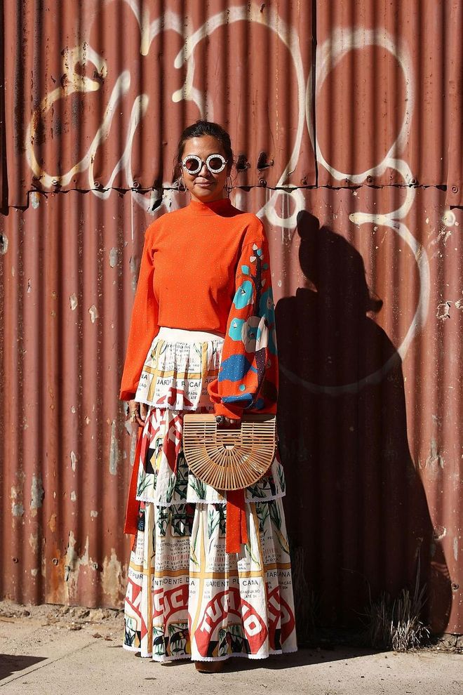 Clarice Chian wearing Poustovit dress, Binny skirt, Celine Shoes, Cult Gaia bag & Gucci sunglasses. Photo: Getty 