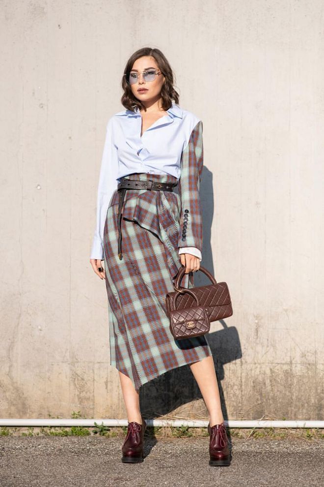 Your typical shirt skirt pairing with a twist. Find an anchor—in this case a tartan print—to tie the look together.