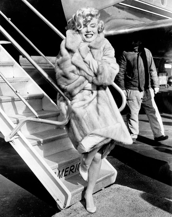 Posing at Laguardia Airport in 1959 before a flight to Chicago.

Photo: Getty 