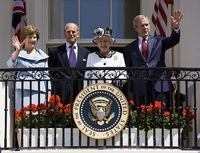 The Queen and Prince Philip standing alongside former President George W. Bush and former First Lady Laura Bush at the White House.