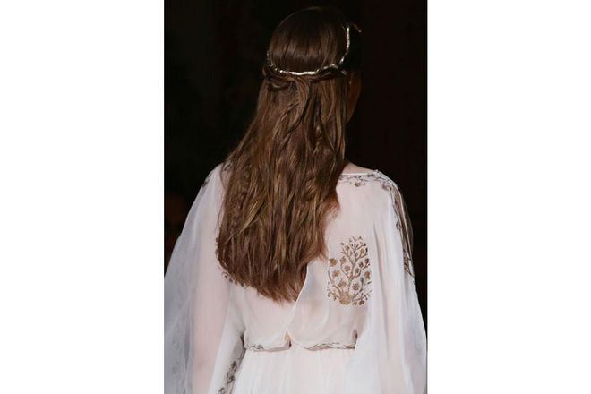 The hair at the Valentino Haute Couture and ready-to-wear shows never fails to impress. For spring/summer 2016, a Medusa-style hair accessory was complemented with loose plaits ; Photo: Getty