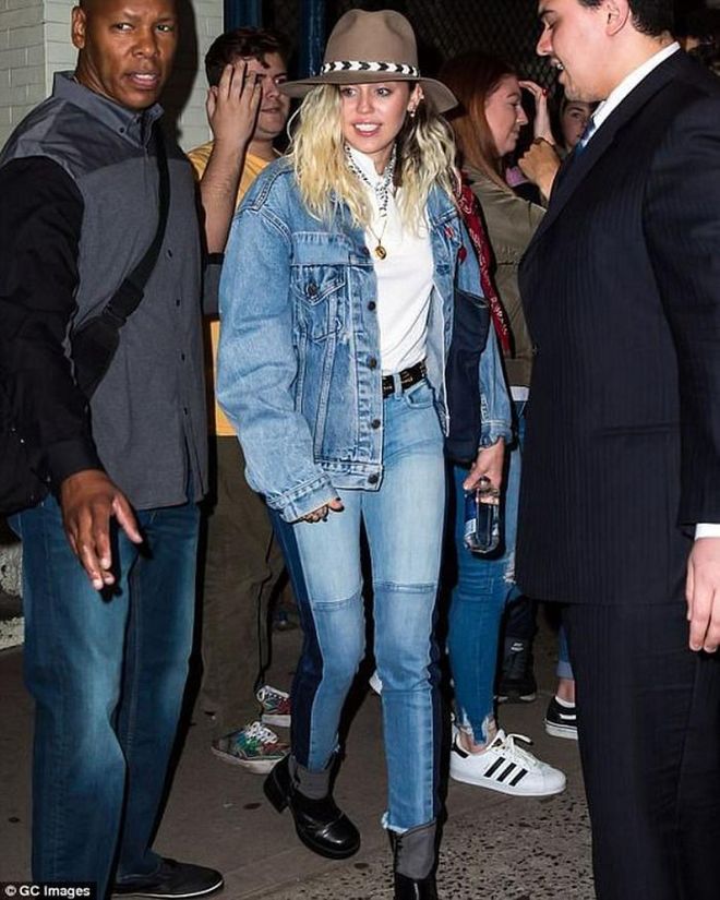 The singer wore double denim with an oversized denim jacket and a fedora.

Photo: Courtesy