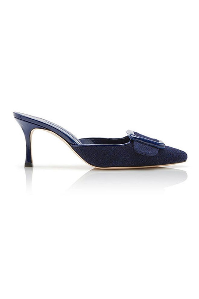 Manolo Blahnik succeeds once again in creating elegant, beautiful shoes that will weather trends - these navy tweed mules are case in point.
Mid-heel mules, £565, Manolo Blahnik.