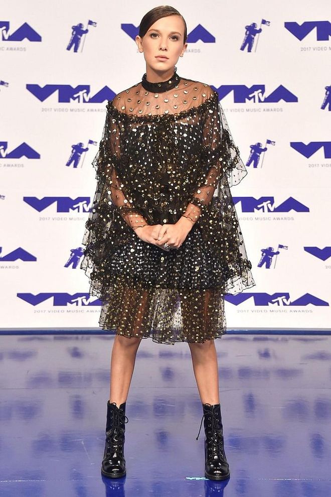 Going edgy, the actress paired her ruffle Rodarte dress with a pair of Stuart Weitzman combat boots.