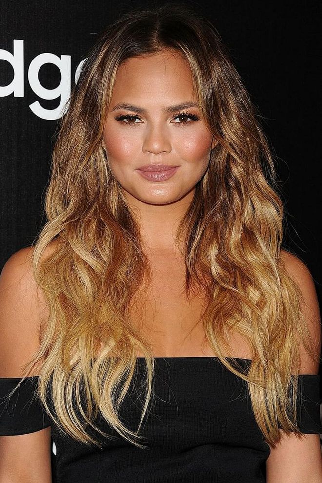 Beachy waves and ombre strands make Teigen's long hair look a must. Photo: Getty 