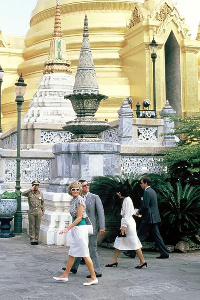 Visiting the Emerald Buddha Temple with Prince Charles during a royal visit to Bangkok, Thailand.