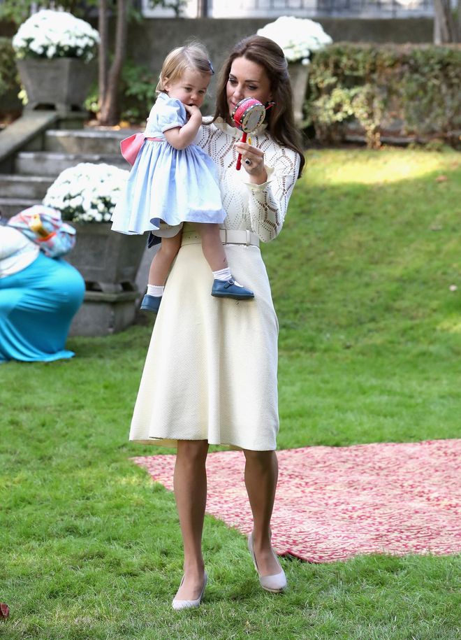The Duchess wore a cream See by Chloe knit dress at a children's party for military families.