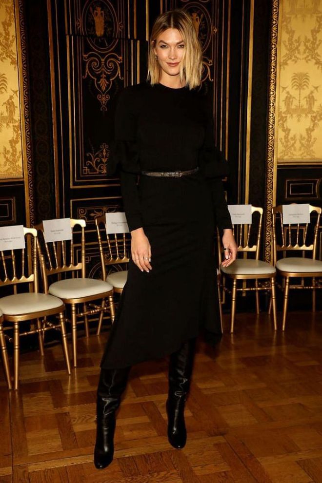 Karlie Kloss looked elegant in the gold panelled room for the Christian Siriano show.

Photo: Getty