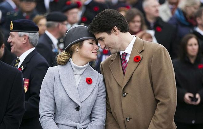 Sharing a moment during Remembrance Day at the National War Memorial in Ottawa, Canada. Photo: Getty 