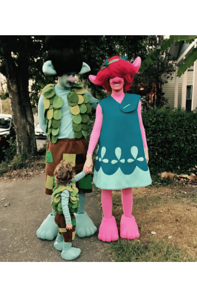 The family went for coordinating Trolls costumes. 