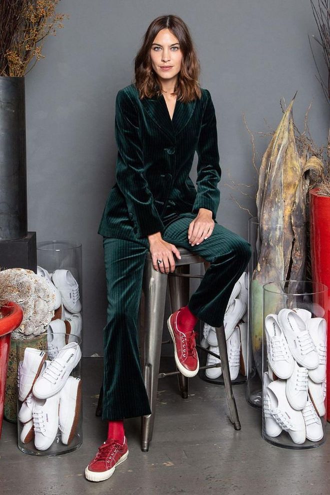 Alexa Chung posed in a green velvet suit and Superga trainers at her event.

Photo: Federico Lomartire