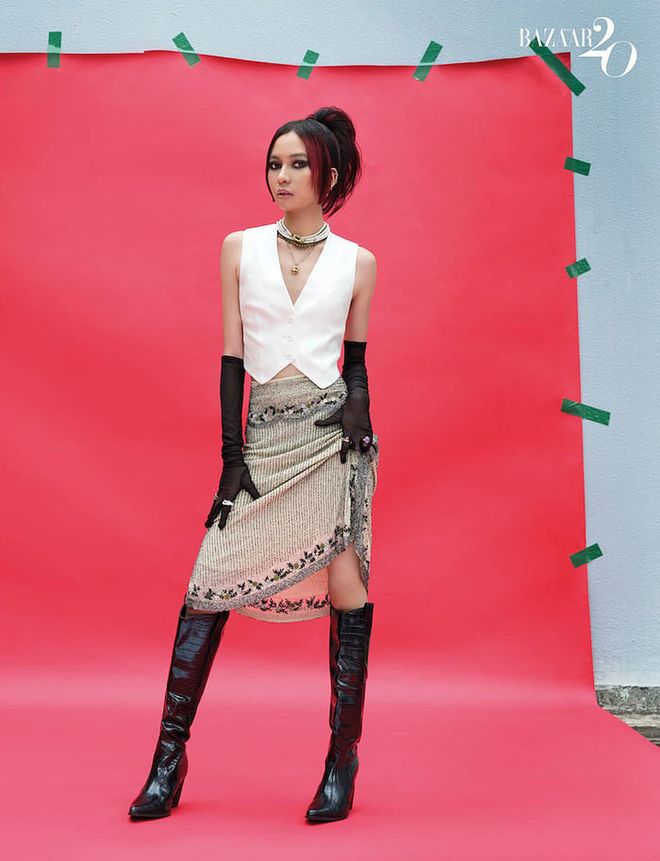 Putri wears vest, by H&M; Skirt, earrings, necklaces, gloves, rings and boots, all Putri’s own. (Photo: Wee Khim)