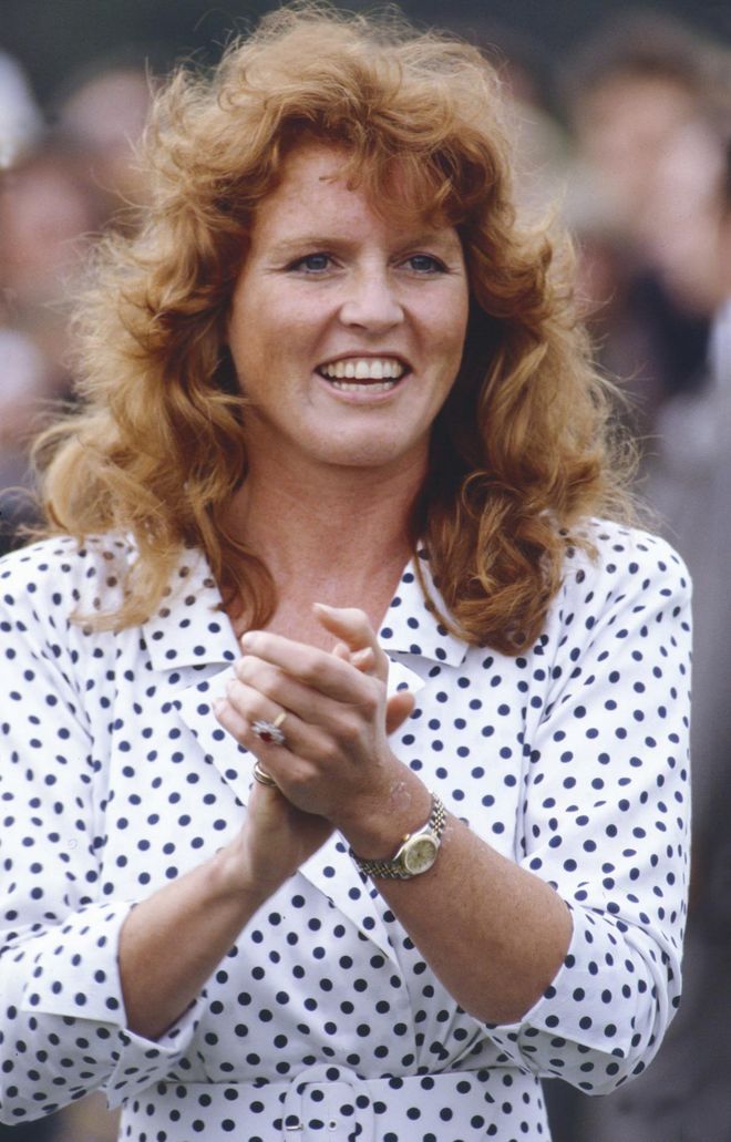 WINDSOR,  ENGLAND -  JUNE 8:   Sarah Ferguson, shortly before her marriage to Prince Andrew, attends a Polo match, at Smiths Lawn, Windsor, and presents the trophy to the winning team. on June 8, 1986  in Windsor, United Kingdom. (Photo by Julian Parker/UK Press via Getty Images)