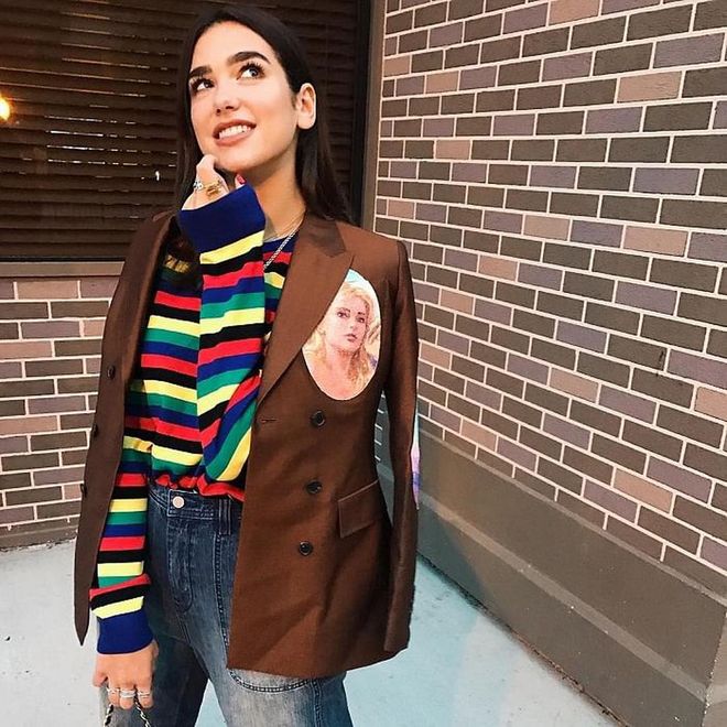 Classy and a little bit preppy, Dua pairs her Uniqlo x J.W. Anderson sweater and denim work trousers
with this Aalto FW17 jacket. Students, listen up: this is what you should be wearing to your next class. 
Photo: Instagram
